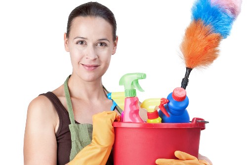 Upholstery cleaning for a bright and tidy living room sofa
