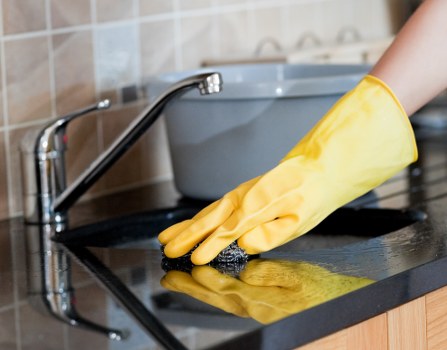 Professional window cleaning improving a bright home exterior