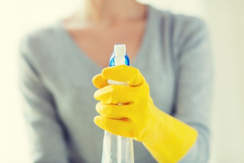 Cleaner performing one off cleaning in an office space